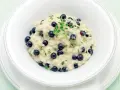 Risotto cremoso con mirtilli e timo, un'idea originale per le tue mirtilli ricette salate.